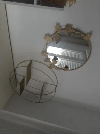 Espejo decorativo dorado con hojas