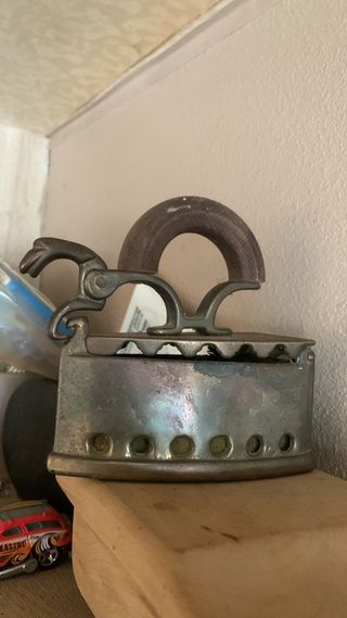 Plancha de carbón antigua