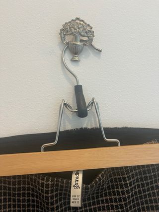 Pantalones de cuadros beige y negro