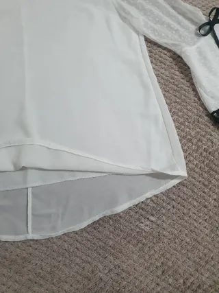 Blusa RLINEA manga acampanada