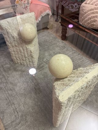 Mesa cristal patas piedra esculturales