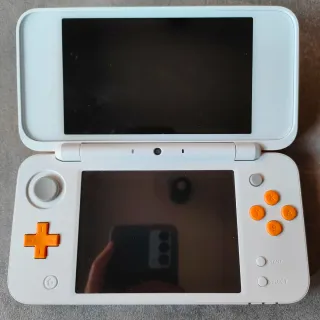 New Nintendo 2DS XL Arancione Bianco Completo