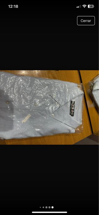 Pantalón Emidio Tucci  y camisa talla  grande.