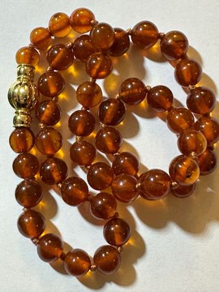 Collane verdi e arancioni