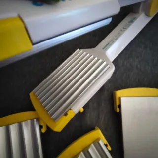 Plancha de pelo BaByliss blanca y amarilla