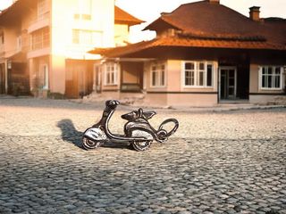 Ciondolo scooter argento. Miniatura da collezione.