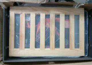 Barbacoa con ruedas y parrilla de hierro