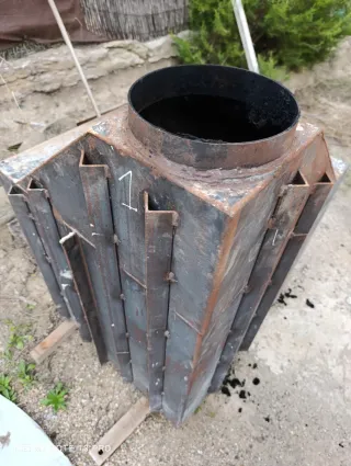 Caja de hierro para fuego a tierra