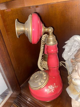 Teléfono antiguo candelabro rosa y dorado