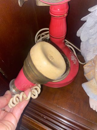 Teléfono antiguo candelabro rosa y dorado