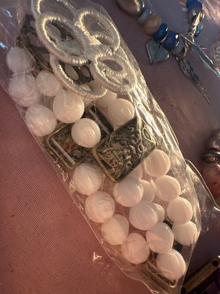 Pulsera Watina con dijes de corazón y pluma