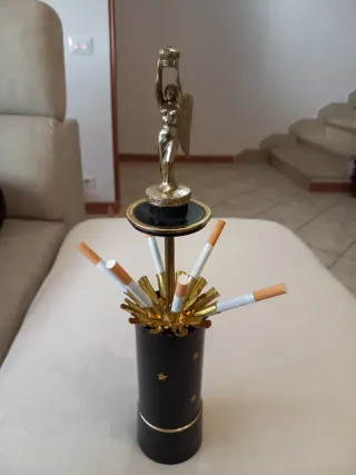 Portasigarette vintage a scomparsa con carillon