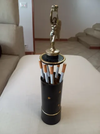 Portasigarette vintage a scomparsa con carillon