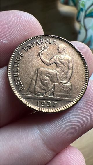 Moneda Variante con cuadrados y sin estrellas.