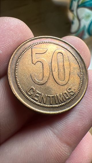 Moneda Variante con cuadrados y sin estrellas.