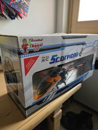 Elicottero radiocomandato arancione lungo cm 40