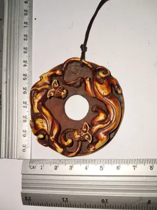 Ciondolo con draghi contrapposti