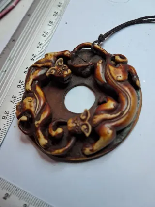 Ciondolo con draghi contrapposti