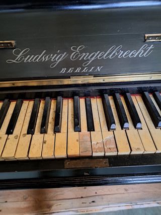 Taburete de piano tapizado