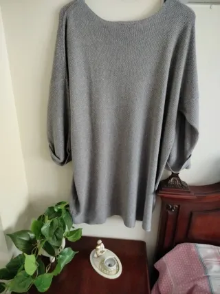 Jersey gris con destellos plateados Talla XL.