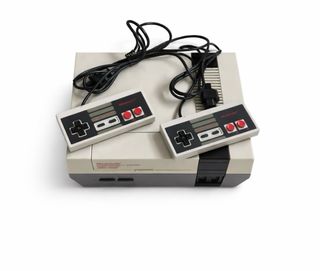 Consola Nintendo NES con 2 mandos