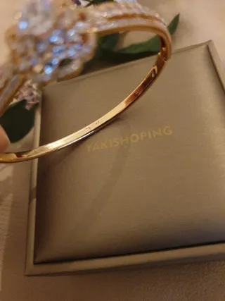 Pulsera chapada en oro con caja