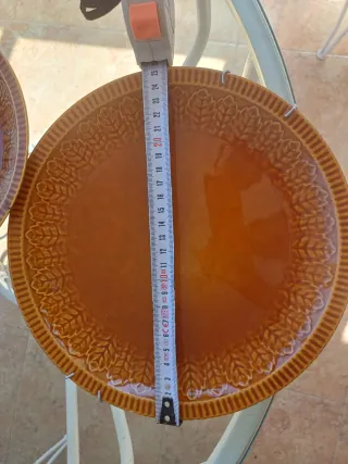 Piatti Dontesa con ganci decorativi