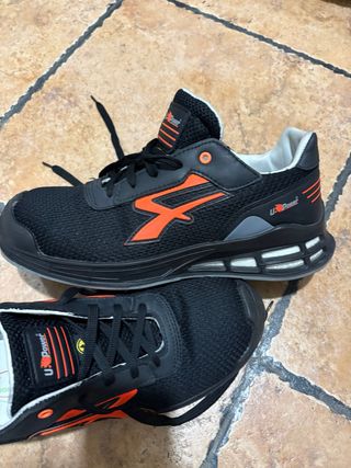 Zapatos de seguridad U-Power negros y naranjas