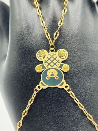 PULSERA MANITA OSO PIEDRA NARANJA. Oro 18k.