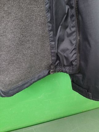 Chubasquero Xcel Surf.