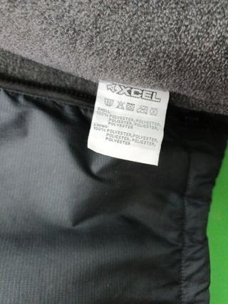 Chubasquero Xcel Surf.