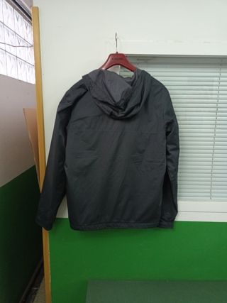 Chubasquero Xcel Surf.