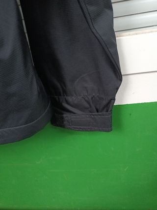 Chubasquero Xcel Surf.