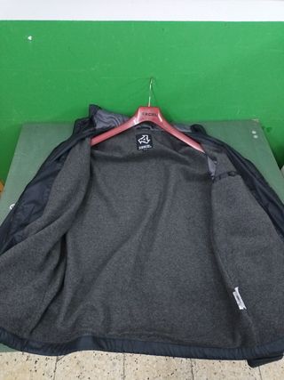 Chubasquero Xcel Surf.