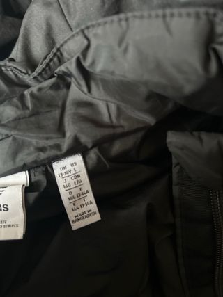 Giubbotto Adidas nero con bande bianche