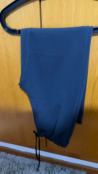 Conjunto americana y pantalón deportivo