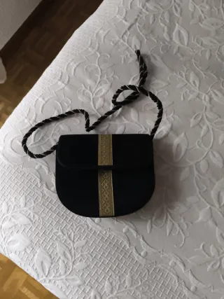Bolso de fiesta negro y dorado
