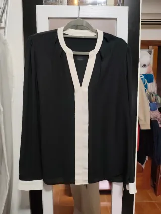 Camisa negra y blanca