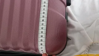 Maleta rosa rígida con ruedas