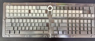 Tasti per tastiera grigi e bianchi