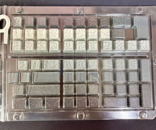 Tasti per tastiera grigi e bianchi