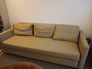 Sofá cama beige de tela