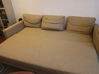 Sofá cama beige de tela