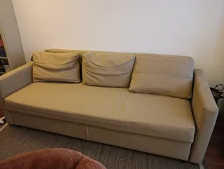 Sofá cama beige de tela