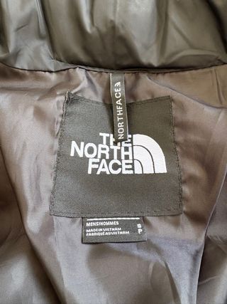 Chaqueta The North Face acolchada gris y negra