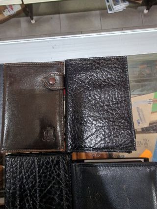 Billeteras de hombre en buen estado