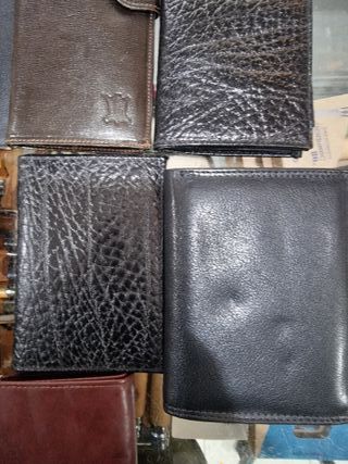 Billeteras de hombre en buen estado