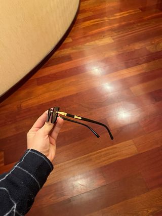 Occhiali Cartier neri e oro