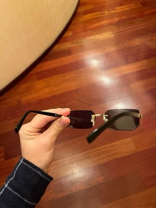 Occhiali Cartier neri e oro