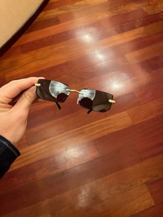 Occhiali Cartier neri e oro